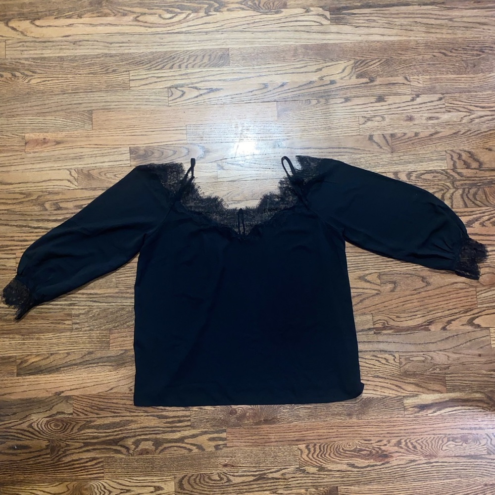 Beautiful black with lace trim blouse! Never worn